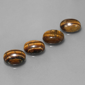 أحجار عين النمر ذهب البنى طبيعية، قصة بيضاوى، غير شفاف، وزنها  قيراط