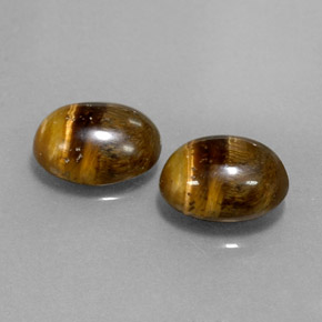 Tiger's Eye طبيعي بلون بني ذهبي، وزن ‎‎ قيراط، شكل بيضاوى، مقاس ‎8.9x6.9‎ مم