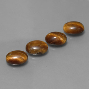 أحجار عين النمر ذهب البنى طبيعية، قصة بيضاوى، غير شفاف، وزنها  قيراط