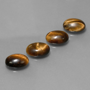 Tiger's Eye طبيعي بلون بني ذهبي، وزن ‎‎ قيراط، شكل بيضاوى، مقاس ‎8.7x6.7‎ مم