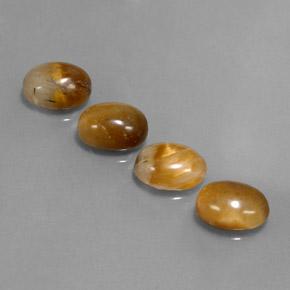 Tiger's Eye طبيعي بلون بنى دافئ، وزن ‎7.27‎ قيراط، شكل بيضاوى، مقاس ‎9x7‎ مم