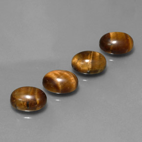 Tiger's Eye طبيعي بلون بني ذهبي، وزن ‎‎ قيراط، شكل بيضاوى، مقاس ‎8.9x7‎ مم