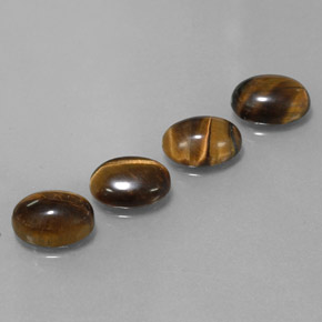 Tiger's Eye طبيعي بلون بني ذهبي، وزن ‎‎ قيراط، شكل بيضاوى، مقاس ‎8.9x6.9‎ مم
