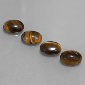 Tiger's Eye طبيعي بلون بني ذهبي، وزن ‎‎ قيراط، شكل بيضاوى، مقاس ‎8.9x6.9‎ مم