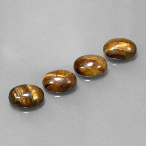 Tiger's Eye طبيعي بلون بني ذهبي، وزن ‎‎ قيراط، شكل بيضاوى، مقاس ‎8.8x6.8‎ مم