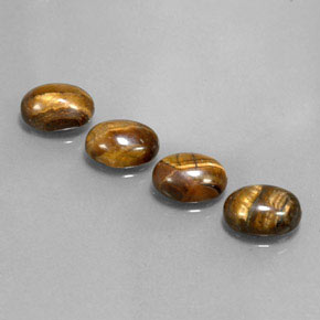 Tiger's Eye طبيعي بلون بني ذهبي، وزن ‎‎ قيراط، شكل بيضاوى، مقاس ‎8.8x6.8‎ مم