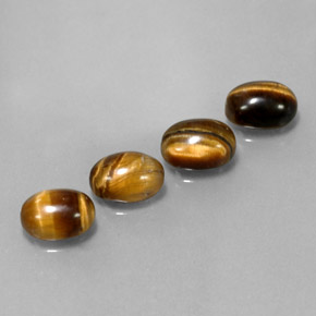 Tiger's Eye طبيعي بلون بني ذهبي، وزن ‎‎ قيراط، شكل بيضاوى، مقاس ‎8x6‎ مم
