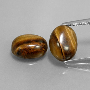Tiger's Eye طبيعي بلون بني ذهبي، وزن ‎‎ قيراط، شكل بيضاوى، مقاس ‎8.8x6.8‎ مم