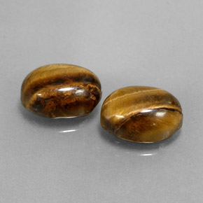 Tiger's Eye طبيعي بلون بني ذهبي، وزن ‎‎ قيراط، شكل بيضاوى، مقاس ‎8.8x6.8‎ مم