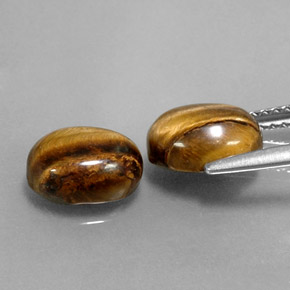 Tiger's Eye طبيعي بلون بني ذهبي، وزن ‎‎ قيراط، شكل بيضاوى، مقاس ‎8.8x6.8‎ مم