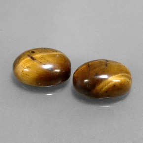 Tiger's Eye طبيعي بلون بني ذهبي، وزن ‎‎ قيراط، شكل بيضاوى، مقاس ‎9x7.1‎ مم