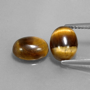 Tiger's Eye طبيعي بلون بني ذهبي، وزن ‎‎ قيراط، شكل بيضاوى، مقاس ‎9x6.9‎ مم