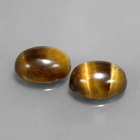 Tiger's Eye طبيعي بلون بني ذهبي، وزن ‎‎ قيراط، شكل بيضاوى، مقاس ‎9x6.9‎ مم