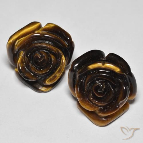 Tiger's Eye طبيعي بلون بنى دافئ، وزن ‎25.60‎ قيراط، شكل قطع زهرة، مقاس ‎15.8x15.6‎ مم