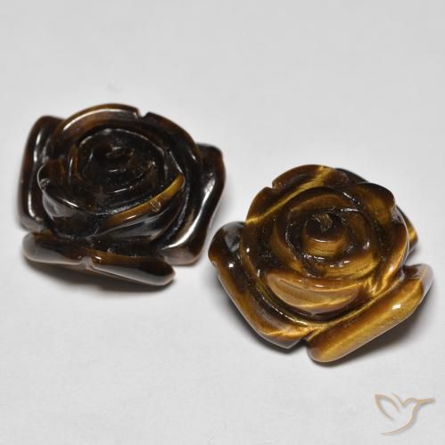 Tiger's Eye طبيعي بلون بنى دافئ، وزن ‎25.60‎ قيراط، شكل قطع زهرة، مقاس ‎15.8x15.6‎ مم