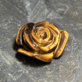 Tiger's Eye طبيعي بلون بني ذهبي، وزن ‎10.21‎ قيراط، شكل قطع زهرة، مقاس ‎16x14.9‎ مم