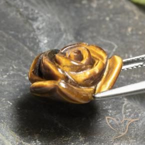 Tiger's Eye طبيعي بلون بني ذهبي، وزن ‎10.21‎ قيراط، شكل قطع زهرة، مقاس ‎16x14.9‎ مم