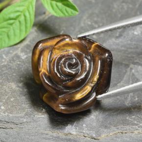 Tiger's Eye طبيعي بلون بني ذهبي، وزن ‎12.56‎ قيراط، شكل قطع زهرة، مقاس ‎16.4x15.9‎ مم