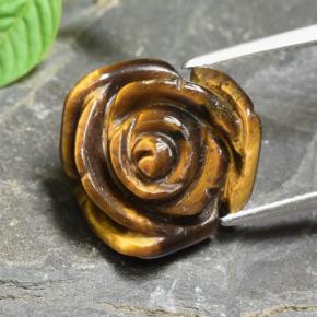 Tiger's Eye طبيعي بلون بنى دافئ، وزن ‎10.74‎ قيراط، شكل قطع زهرة، مقاس ‎15.3x15.2‎ مم