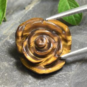 Tiger's Eye طبيعي بلون بني ذهبي، وزن ‎11.12‎ قيراط، شكل قطع زهرة، مقاس ‎15.7x15‎ مم