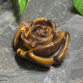 Tiger's Eye طبيعي بلون بني ذهبي، وزن ‎11.12‎ قيراط، شكل قطع زهرة، مقاس ‎15.7x15‎ مم