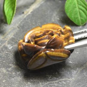 Tiger's Eye طبيعي بلون بني ذهبي، وزن ‎11.12‎ قيراط، شكل قطع زهرة، مقاس ‎15.7x15‎ مم