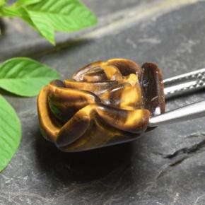 Tiger's Eye طبيعي بلون بني ذهبي، وزن ‎11.92‎ قيراط، شكل قطع زهرة، مقاس ‎15.8x15.7‎ مم
