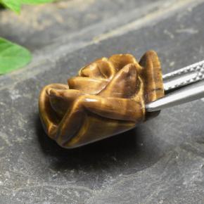 Tiger's Eye طبيعي بلون بنى دافئ، وزن ‎12.09‎ قيراط، شكل قطع زهرة، مقاس ‎16.3x16.2‎ مم