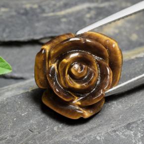 Tiger's Eye طبيعي بلون بنى متوسط، وزن ‎10.88‎ قيراط، شكل قطع زهرة، مقاس ‎15.7x15.1‎ مم