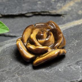 Tiger's Eye طبيعي بلون بنى متوسط، وزن ‎10.88‎ قيراط، شكل قطع زهرة، مقاس ‎15.7x15.1‎ مم