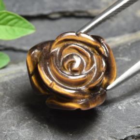 Tiger's Eye طبيعي بلون بني ذهبي، وزن ‎11.54‎ قيراط، شكل قطع زهرة، مقاس ‎15.6x15.1‎ مم