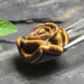 Tiger's Eye طبيعي بلون بني ذهبي، وزن ‎11.54‎ قيراط، شكل قطع زهرة، مقاس ‎15.6x15.1‎ مم
