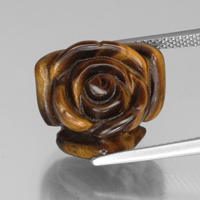 Tiger's Eye طبيعي بلون بني ذهبي، وزن ‎13.31‎ قيراط، شكل شكل خيالي، مقاس ‎16.2x15.6‎ مم