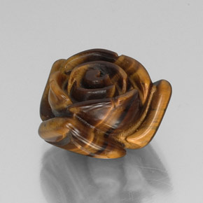 Tiger's Eye طبيعي بلون بني ذهبي، وزن ‎13.31‎ قيراط، شكل شكل خيالي، مقاس ‎16.2x15.6‎ مم