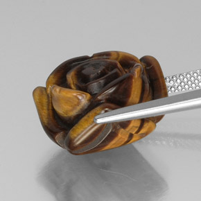 Tiger's Eye طبيعي بلون بني ذهبي، وزن ‎13.31‎ قيراط، شكل شكل خيالي، مقاس ‎16.2x15.6‎ مم