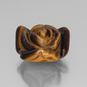Tiger's Eye طبيعي بلون بني ذهبي، وزن ‎9.94‎ قيراط، شكل شكل خيالي، مقاس ‎15.2x14.7‎ مم