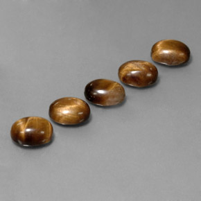 Tiger's Eye طبيعي بلون بني ذهبي، وزن ‎‎ قيراط، شكل بيضاوى، مقاس ‎9x7‎ مم