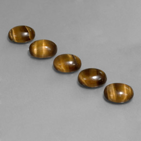 Tiger's Eye طبيعي بلون بني ذهبي، وزن ‎‎ قيراط، شكل بيضاوى، مقاس ‎8.8x6.8‎ مم