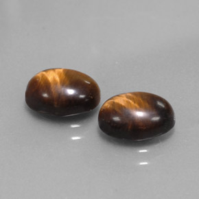 Tiger's Eye طبيعي بلون بني ذهبي، وزن ‎‎ قيراط، شكل بيضاوى، مقاس ‎8.8x6.9‎ مم