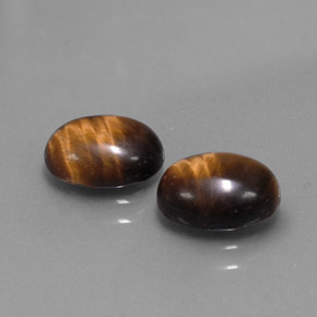 Tiger's Eye طبيعي بلون بني ذهبي، وزن ‎‎ قيراط، شكل بيضاوى، مقاس ‎8.8x6.9‎ مم