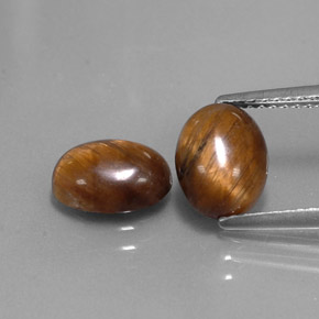 Tiger's Eye طبيعي بلون بني ذهبي، وزن ‎‎ قيراط، شكل بيضاوى، مقاس ‎8.8x6.7‎ مم