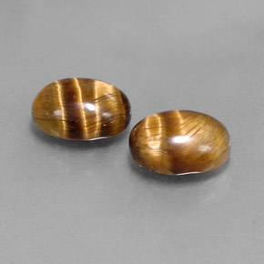 Tiger's Eye طبيعي بلون بني ذهبي، وزن ‎‎ قيراط، شكل بيضاوى، مقاس ‎8.8x6.9‎ مم