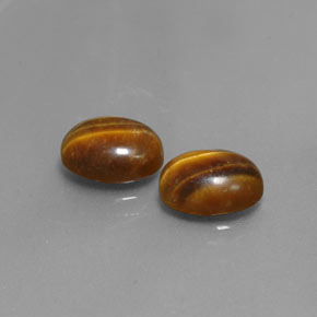 Tiger's Eye طبيعي بلون بني ذهبي، وزن ‎‎ قيراط، شكل بيضاوى، مقاس ‎8.9x6.9‎ مم