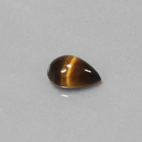 Tiger's Eye طبيعي بلون بني ذهبي، وزن ‎0.70‎ قيراط، شكل شكل الكمثرى، مقاس ‎7.2x5‎ مم