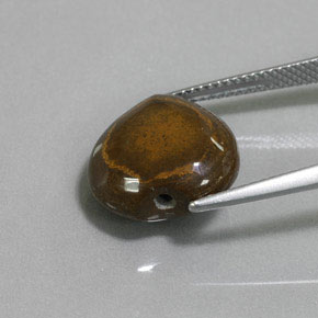 Tiger's Eye طبيعي بلون بني ذهبي، وزن ‎9.02‎ قيراط، شكل شكل القلب، مقاس ‎13.6x13.2‎ مم