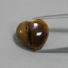 Tiger's Eye طبيعي بلون بني ذهبي، وزن ‎9.47‎ قيراط، شكل شكل القلب، مقاس ‎14.3x13.1‎ مم