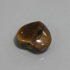 Tiger's Eye طبيعي بلون بني ذهبي، وزن ‎9.47‎ قيراط، شكل شكل القلب، مقاس ‎14.3x13.1‎ مم