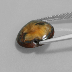 Tiger's Eye طبيعي بلون بني ذهبي، وزن ‎9.68‎ قيراط، شكل شكل القلب، مقاس ‎14.3x13.8‎ مم