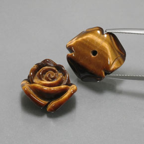 Tiger's Eye طبيعي بلون بني ذهبي، وزن ‎‎ قيراط، شكل شكل خيالي، مقاس ‎16.1x15.6‎ مم