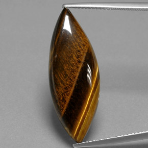 Tiger's Eye طبيعي بلون بني ذهبي، وزن ‎16.23‎ قيراط، شكل ماركيز، مقاس ‎31.4x11.8‎ مم